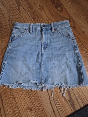 American Eagle Outfitters Light Blue Denim Mini Skirt with Frayed Hem